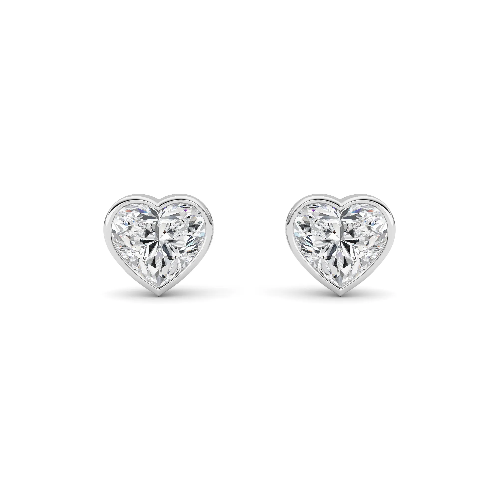 Gracia de Lluvia lab grown diamond earrings, detail of the heart diamond